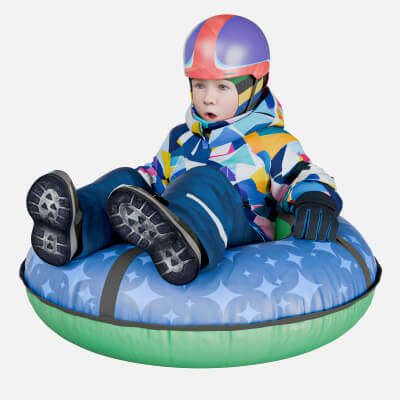 Cute Kid in Helmet Rides a Snow Tubing